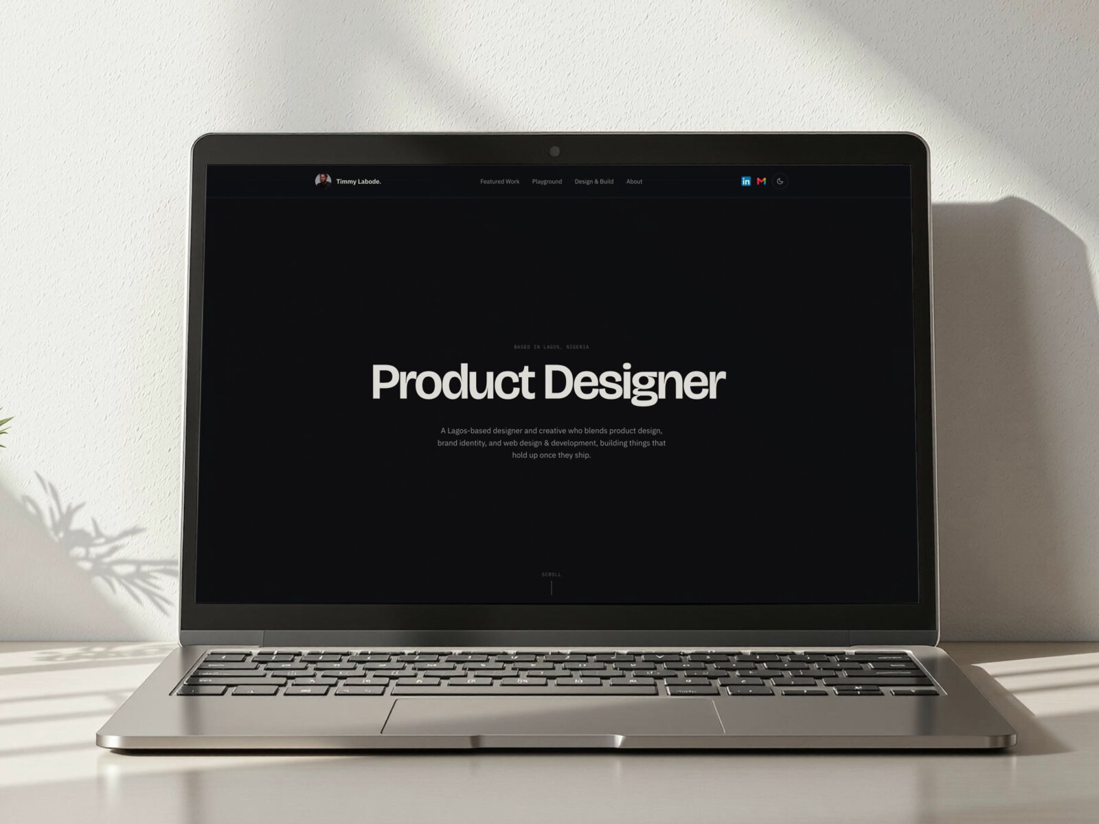 This portfolio site shown on a laptop screen